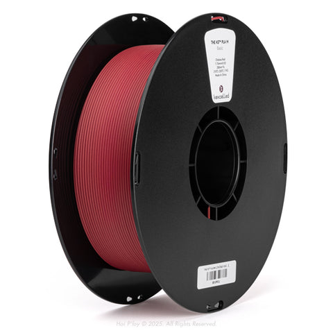 Reel of matte Chelsea Red PLA 3D printing filament on a black plastic spool, shown from a three-quarter front view angle with a white background.