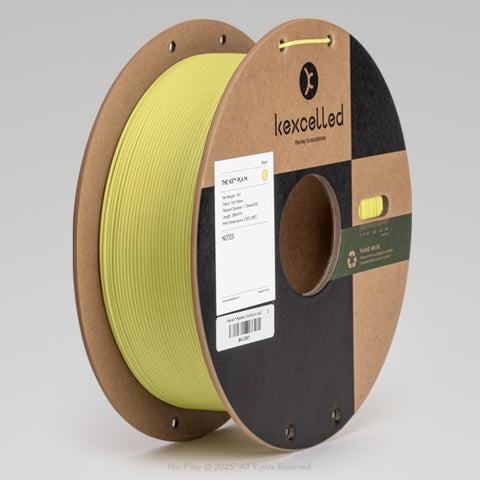 Reel of matte hot yellow PLA 3D printing filament on a recycled cardboard spool, shown from a three-quarter front view angle with a light grey background.